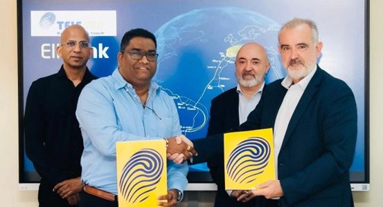 Doric Ramlakhan from Telesur and Diego Matas from EllaLink sign letter of intent in Suriname